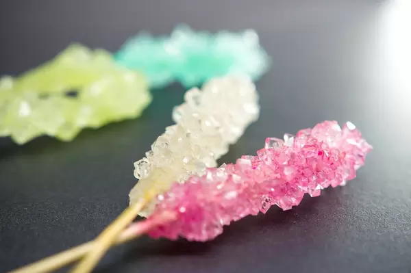 Rock candy on a black surface
