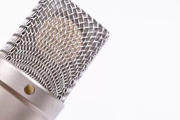 Rode NT1A condenser microphone with copy space above white