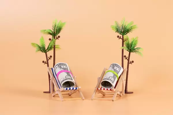 Rolls of dollar banknotes in a deck chair