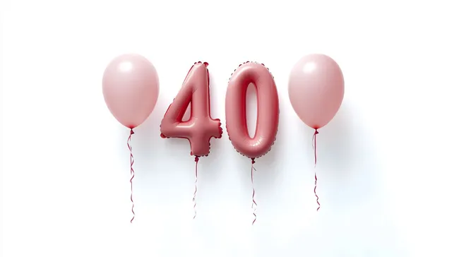 Rosa Luftballons zum 40. Geburtstag auf weißem Hintergrund