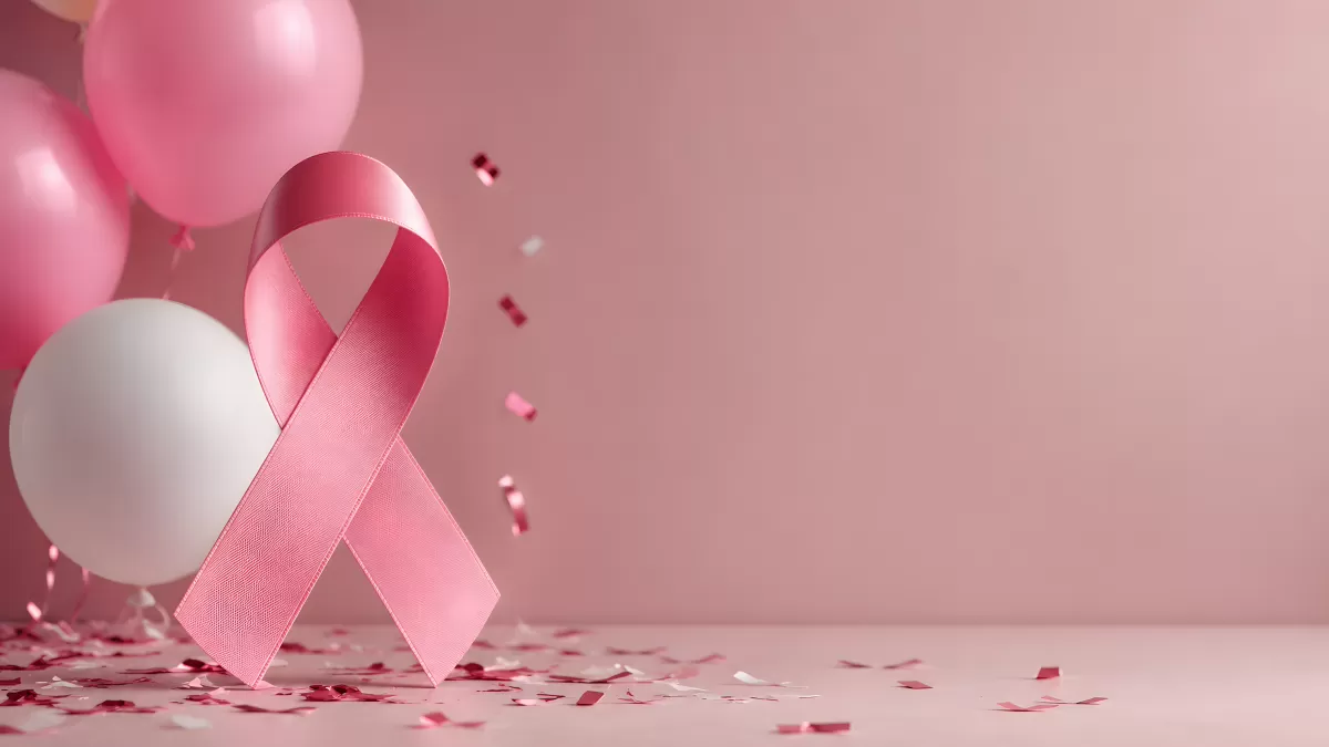 Rosa Schleife mit Ballons für Brustkrebsbewusstsein