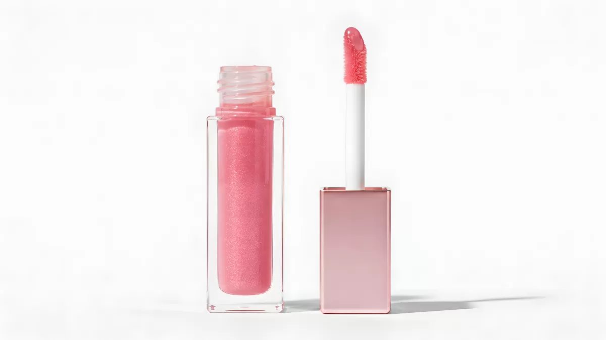 Rosafarbener Lipgloss mit Glitzer geöffnet
