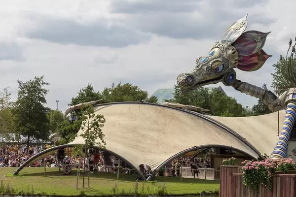 Rose Garden stage with an enormous metallic dragon at Tomorrowland festival
