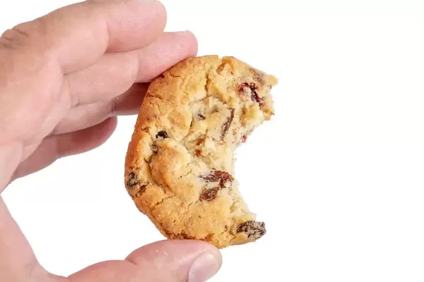 Round Biscuits with Raisins in the hand