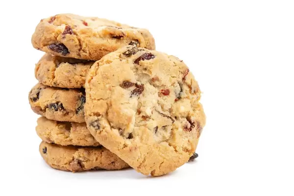 Round Biscuits with Raisins isolated above white background (Flip 2019)