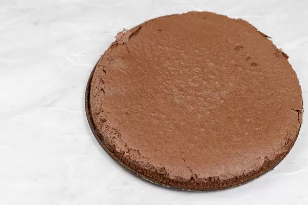 Round Chocolate cake on the table with copy space