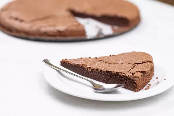 Round Chocolate cake slice on the plate