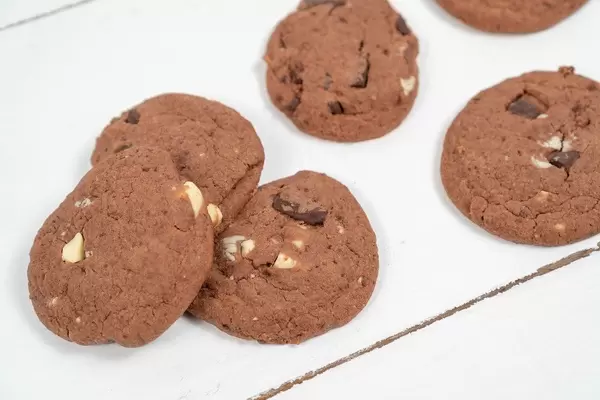 Round Chocolate Cookies on the wooden table (Flip 2020)
