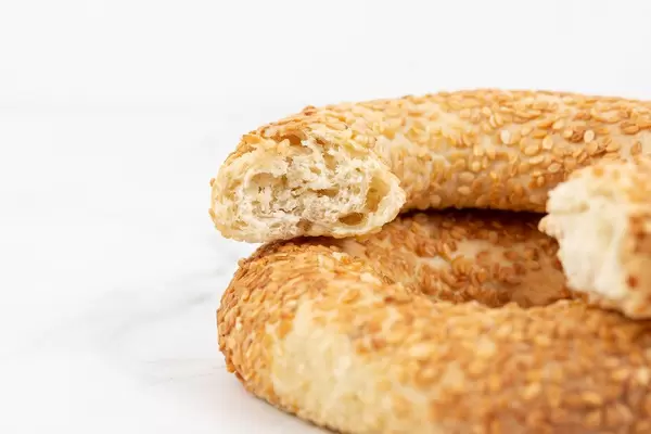 Round Pastry with sesame above white background
