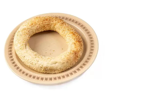 Round Pastry with Sesame isolated above white background (Flip 2019)