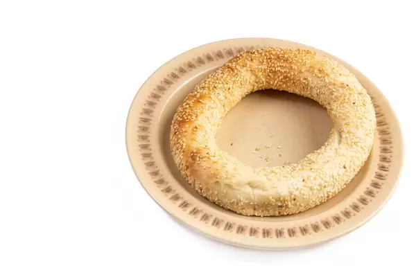 Round Pastry with Sesame isolated above white background