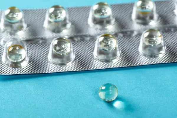 Round tablets on blue background