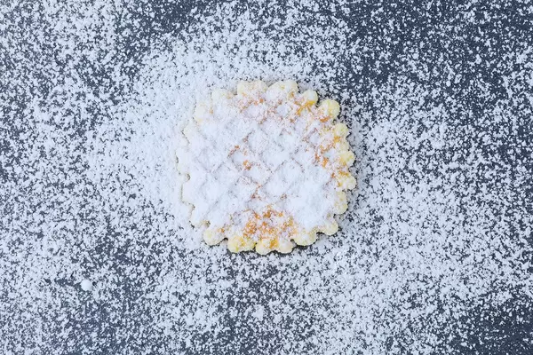 Round waffle with sugar