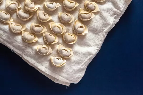 Row Dumplings. Half-finished products. Preparation to boil the dumplings.