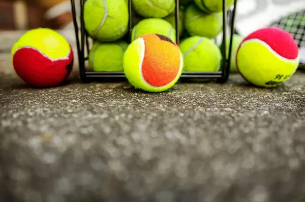 Row of kids tennis balls