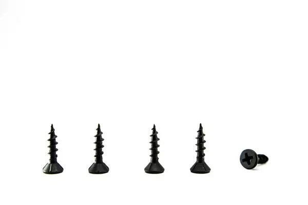 Row of small black screws