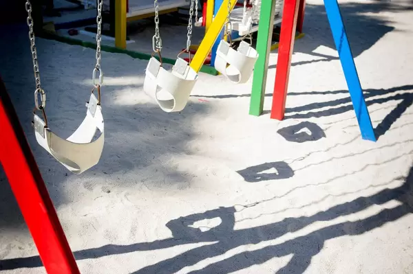 Row of swings for kids
