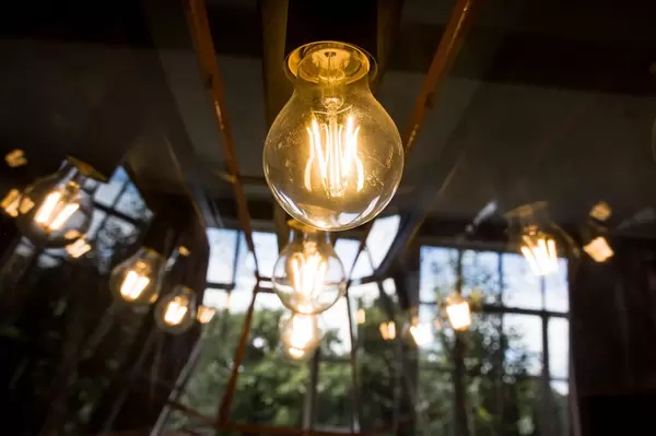 Row of traditional incandescent lightbulbs