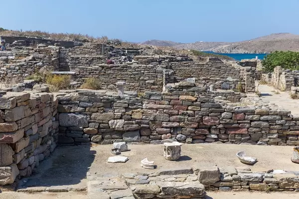 Ruins of ancient houses at the theatre quarter of the World Heritage site of Delos in the Cyclades, Greece