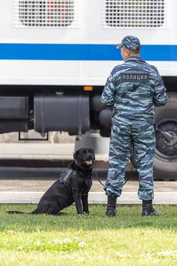 Russian officer with police dog
