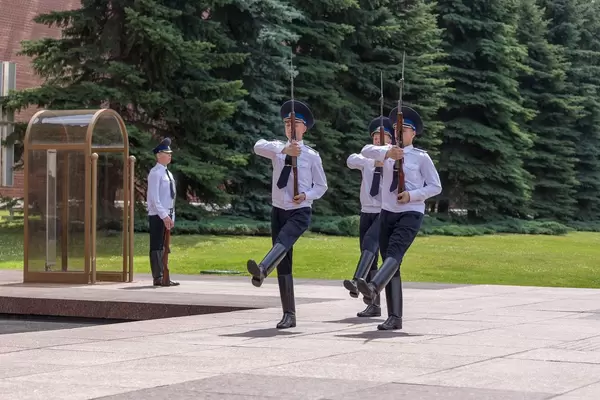 Russian soldiers marching with WW1 rifles in hands