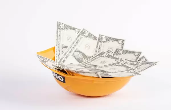 Safety helmet full of money