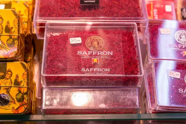Saffron Strands sold in a plastic box at a spice stand in Barcelonas most famous market hall "Mercat de Sant Josep", Spain