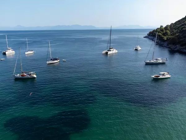 Sailing boats in the bay of Agnontas, Skopelos, Northern Sporades, Greece