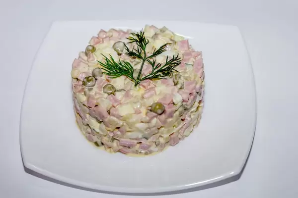 Salad olivier on a plate  Flip 2019