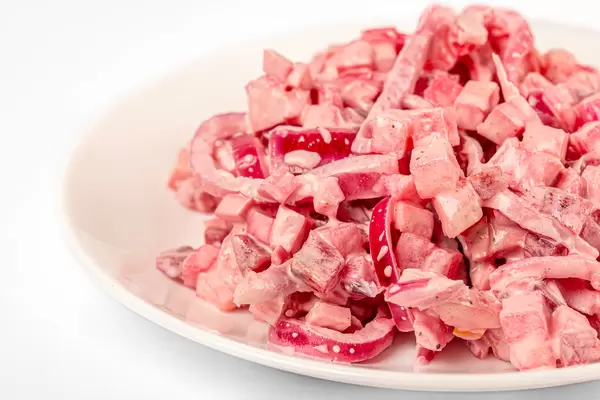 Salad with pickled purple onion and sausage