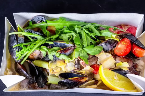 Salad with seafood and arugula