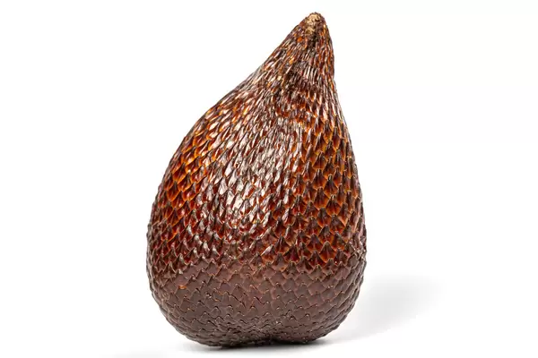 Salak fruit or snake fruit over white background