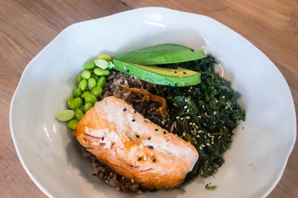 Salmon (sustainable fishing), whole grain wild rice, sesame-spinach, avocado, edamame, home-made teriyaki sauce
