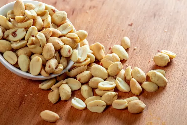 Salted roasted peanuts in a bowl (Flip 2019)