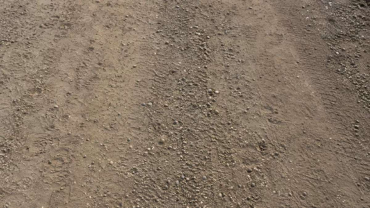 Sandiger Schotterweg mit Kieseln aus der Vogelperspektive