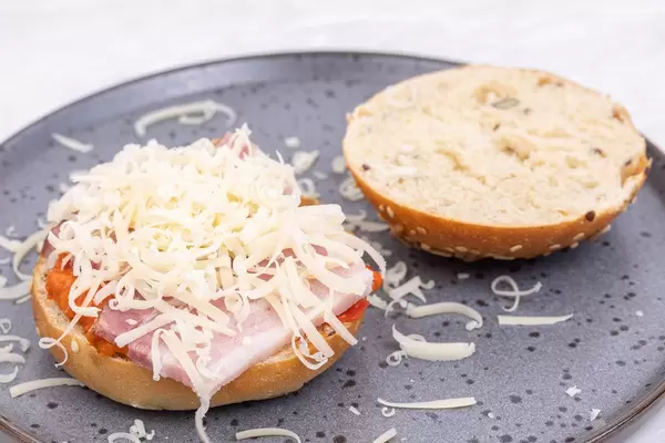 Sandwich with Buns Bacon Paprika spread and grated Cheese