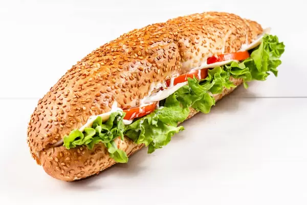 Sandwich with Lettuce Cheese Ham and Tomato isolated on white (Flip 2019)