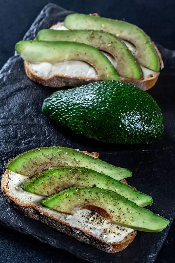 Sandwiches with avocado and herbs