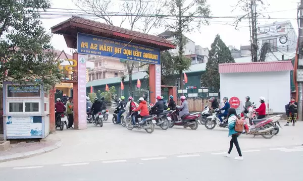 Sapa Vietnam School Entrance with Motocycle in front  (Flip 2019)