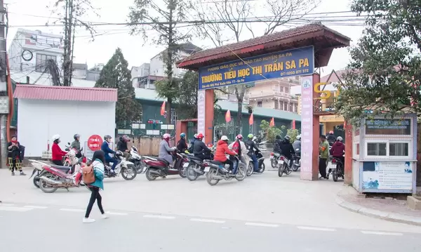 Sapa Vietnam School Entrance with Motocycle in front