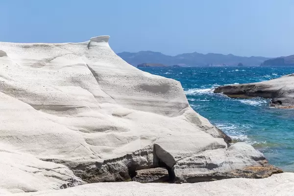 Sarakiniko on the bright, rocky coast of Milos, southwesternmost island in the Cyclades