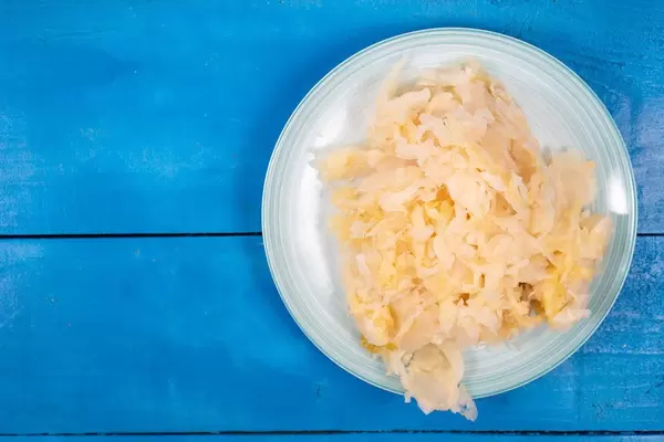 Sauerkraut on the plate with copy space