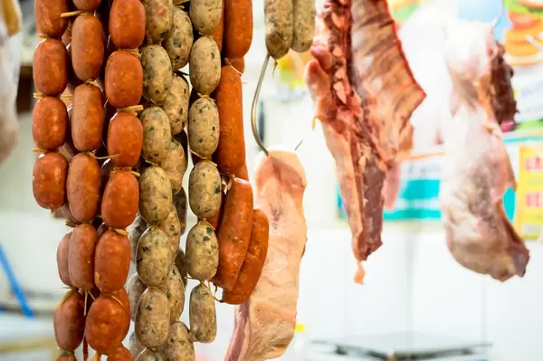 Sausages hanging in a butcher shop