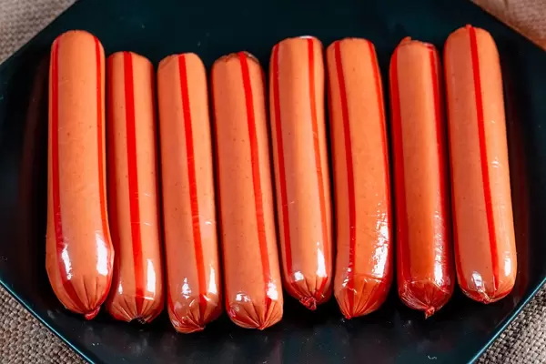 Sausages on a black plate  Flip 2019