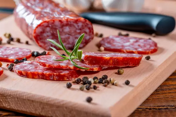 Sausages with peppers and rosemary