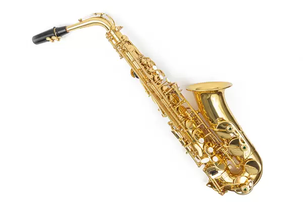 Saxophone above white background with copy space