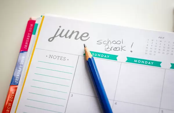 School Break Calendar With Blue Pencil
