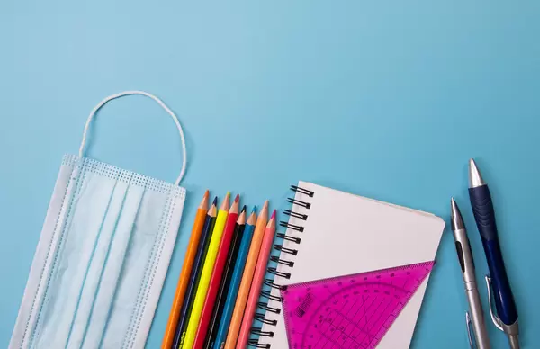 School supplies on blue background