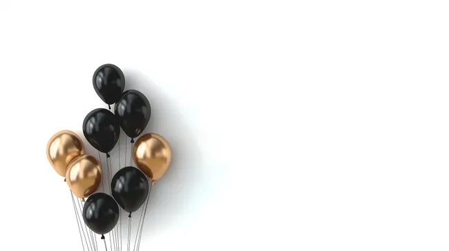 Schwarze und goldene Ballons auf weißem Hintergrund