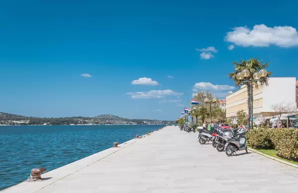 Scooters parked on the beautiful coast